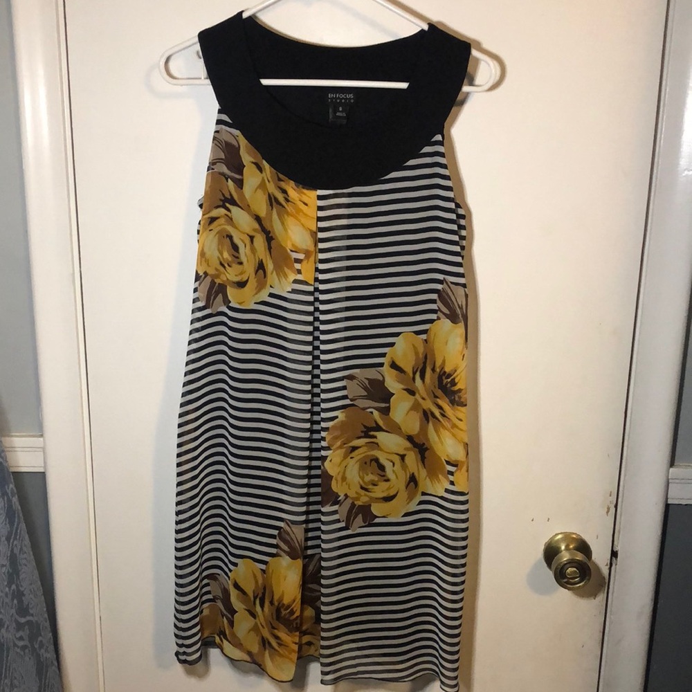 En Focus classy yellow rose dress with black and white stripes.